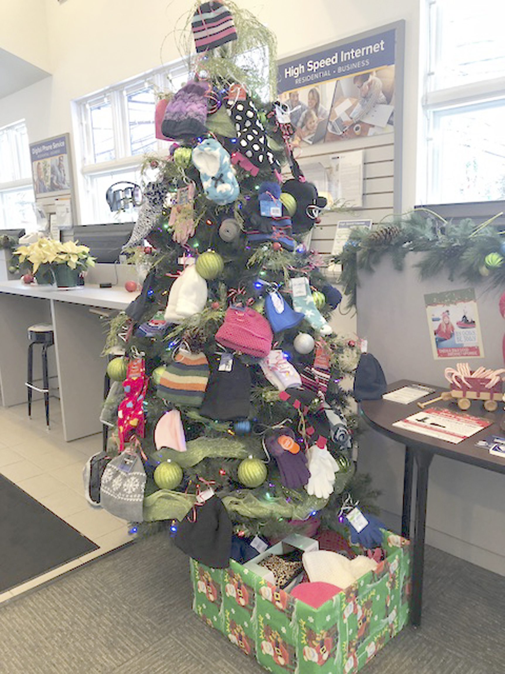 DFT Communications gives back with ‘Bundle Up for the Holidays’ Tree of